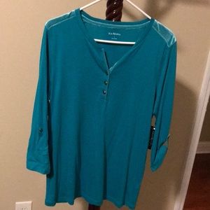 Woman’s green Henley  Kim Rogers top, with velveteen shoulders.